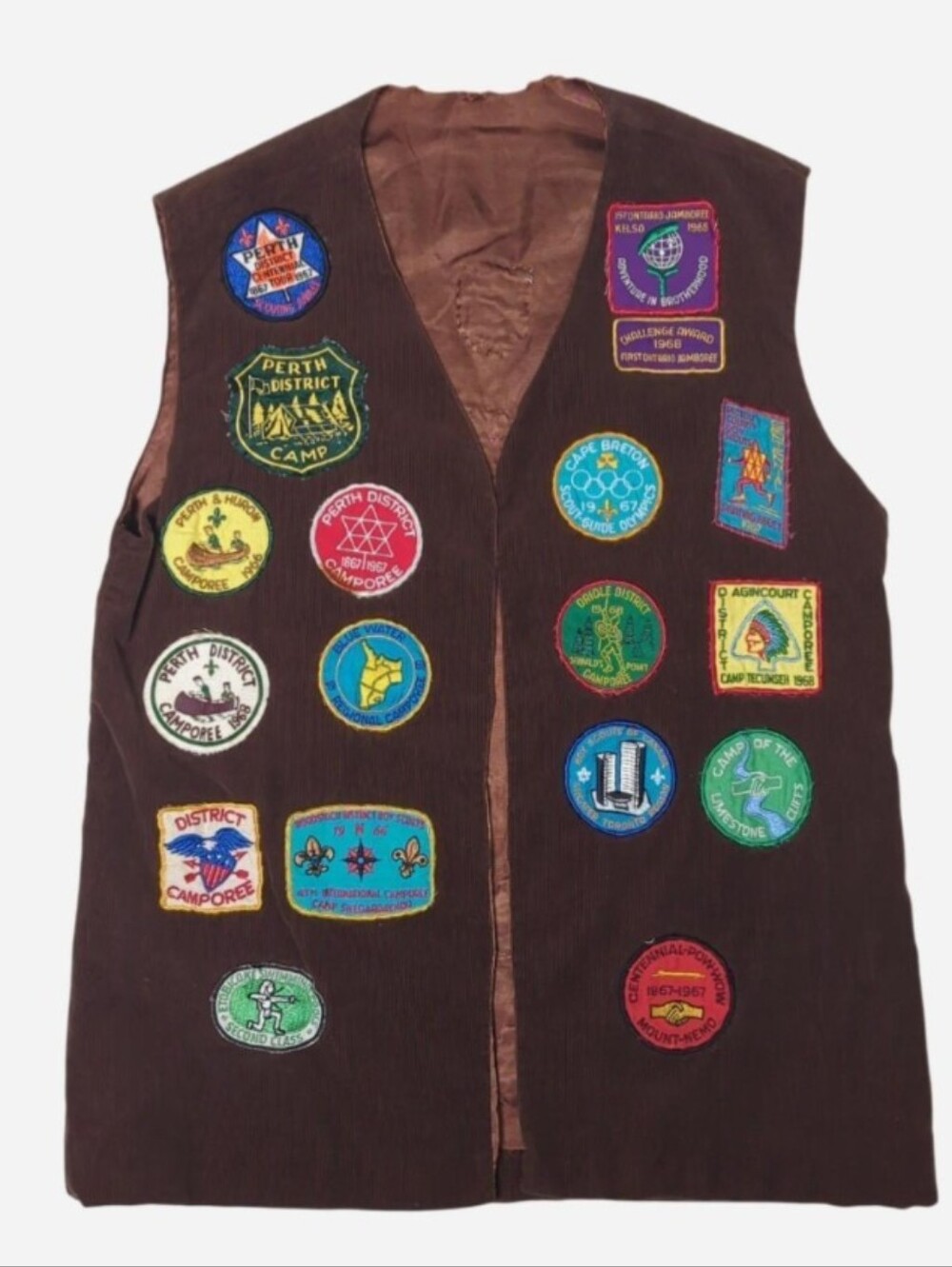 Scouts Brown vest featuring various embroidered patches from the late 1960s